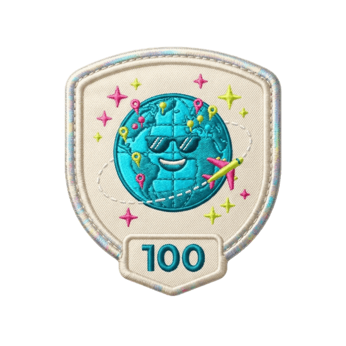 Globetrotter sticker — a globe on a cream shield, tier 100