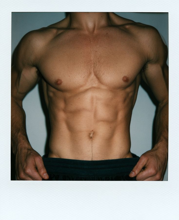 A polaroid-style shot of a man's torso